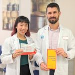 two pharmacists hold information about HIV testing